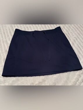 Riders by Lee blue athletic pull-on skirt with pink logo accent